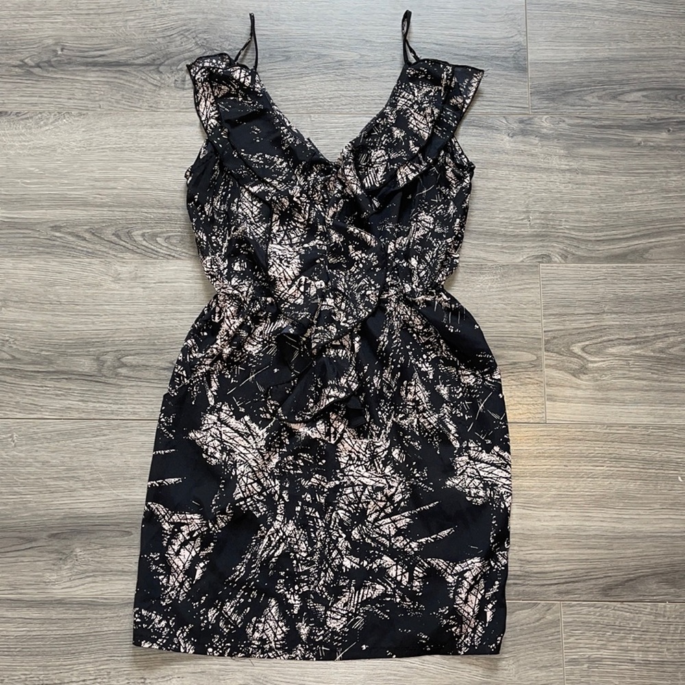 Black & beige mini dress with ruffles and pockets